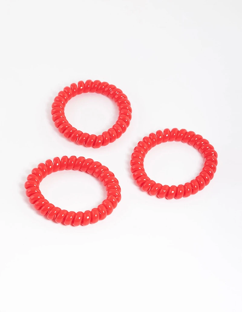 Pack spiralé en plastique rouge pour grands cheveux