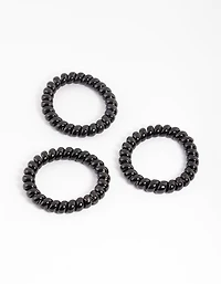 Sachet spiralé en plastique noir pour grands cheveux