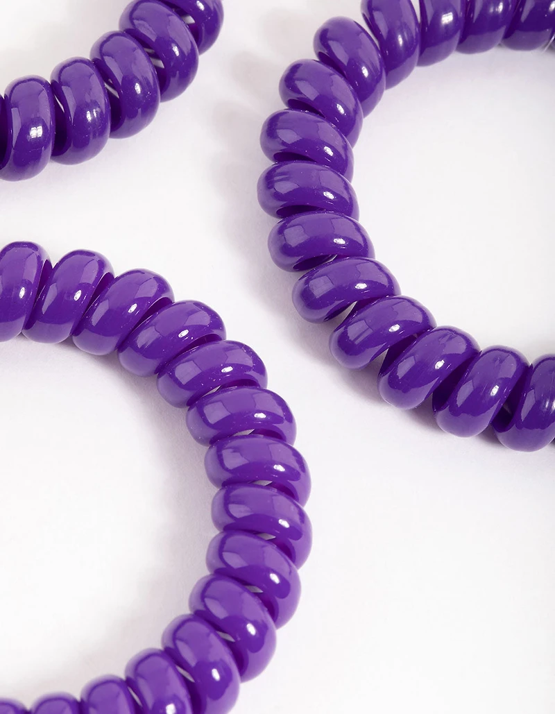 Pack en spirale en plastique violet pour grands cheveux