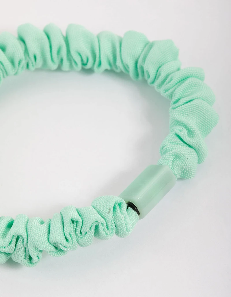 Chouchou fin à pince en tissu turquoise