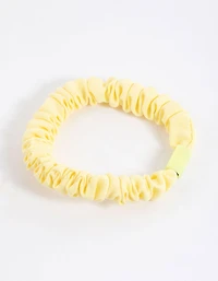 Scrunchie mince à pince en tissu jaune