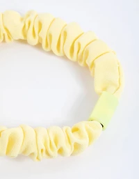 Scrunchie mince à pince en tissu jaune