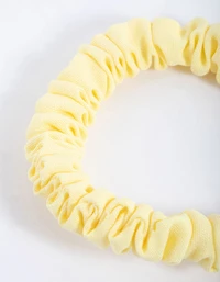 Scrunchie mince à pince en tissu jaune