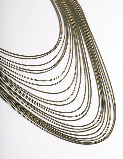 Collier en drapé en or avec une chaîne de coupe-tasse