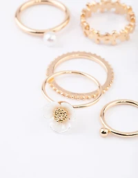 Pack de 6 bagues en fleur perle dorée