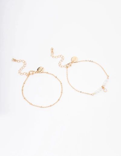 Paquet de bracelets en perles d’or