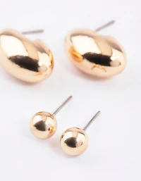Paquet de boucles d’oreilles dorées ovales à clous
