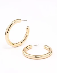 Grandes boucles d’oreilles en forme de cerceau plaquées or