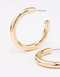 Grandes boucles d’oreilles en forme de cerceau plaquées or