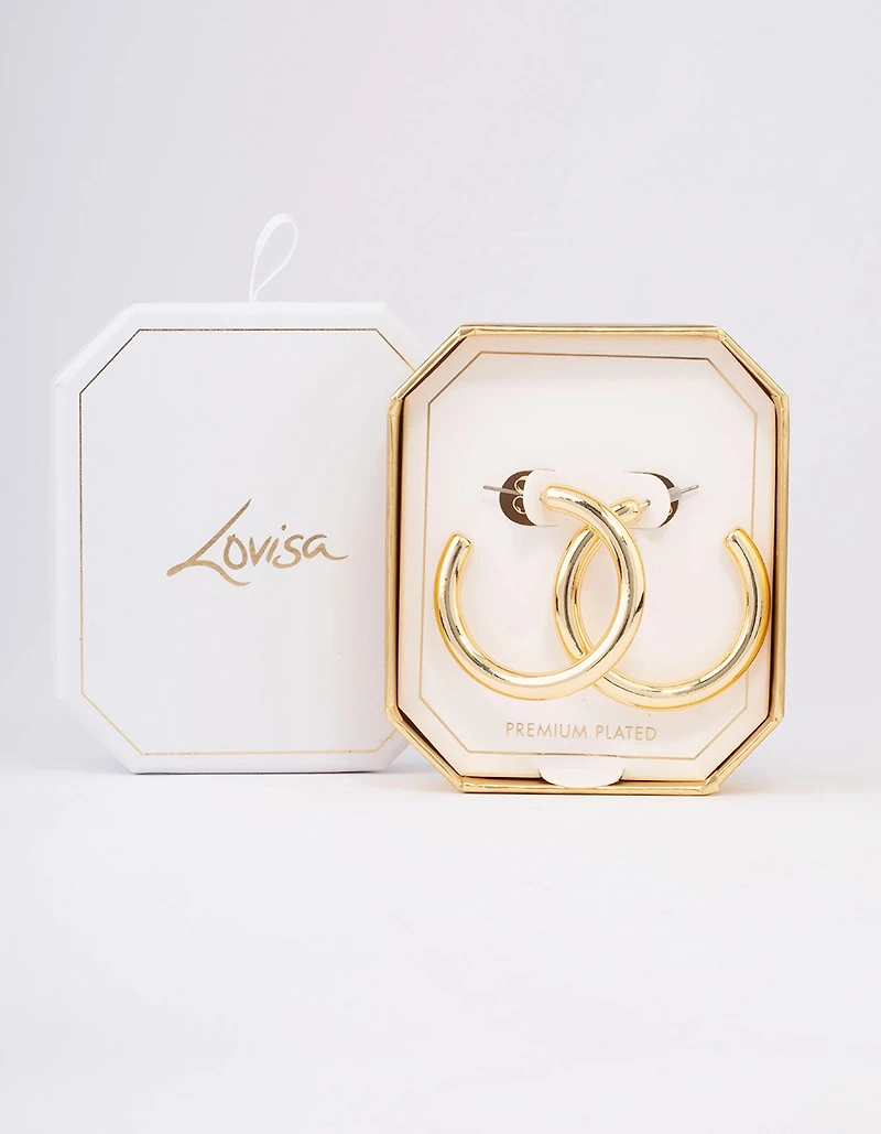 Grandes boucles d’oreilles en forme de cerceau plaquées or