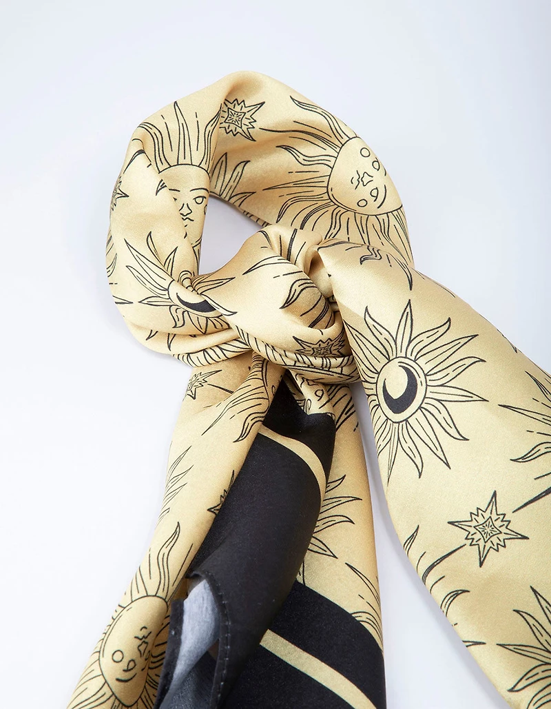 Écharpe Soleil Céleste en tissu noir et or