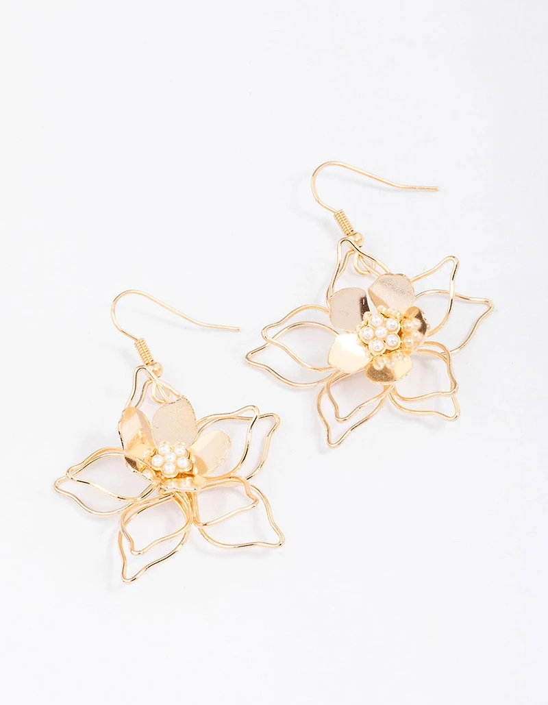 Boucles d’oreilles en fil d’or et perles en forme de fleur