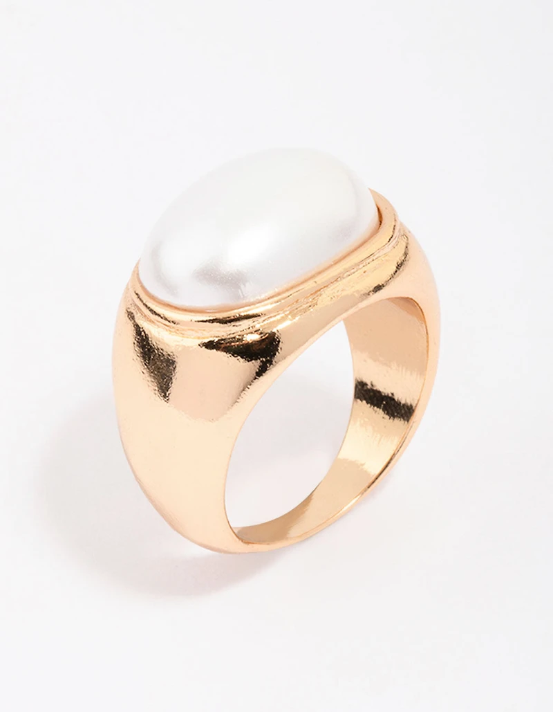 Bague cocktail ovale dorée en perles épaisses