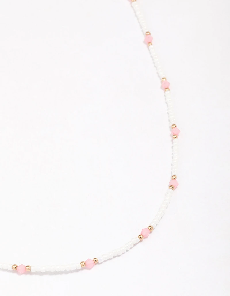 Collier à chaînes à facettes ornées de perles d’or