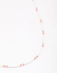 Collier à chaînes à facettes ornées de perles d’or