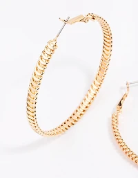 Boucles d’oreilles en or à spirales plates