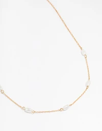 Gold Oval Pearl Station Necklace