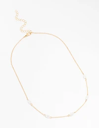Gold Oval Pearl Station Necklace