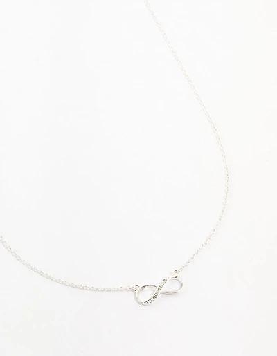 Silver Encased Diamante Infinity Necklace