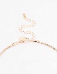 Collier chaîne à pompons en or rose