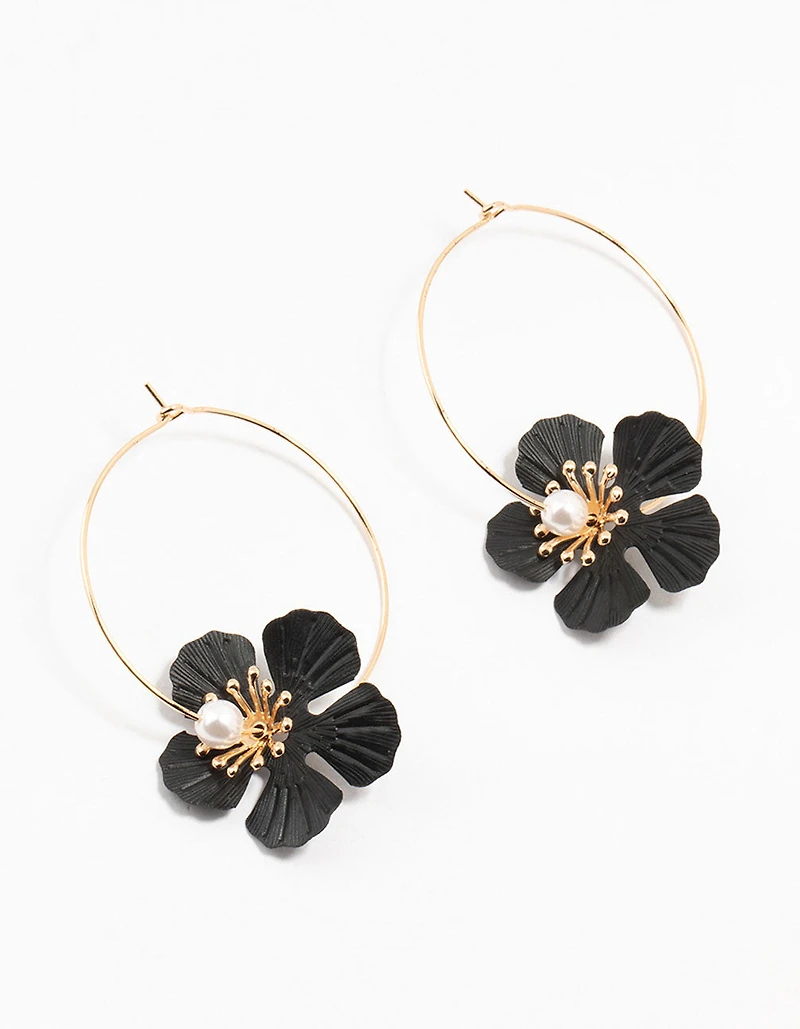 Boucles d’oreilles en forme de cerceau en perles texturées dorées et noires