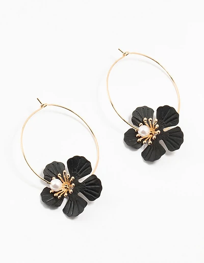 Boucles d’oreilles en forme de cerceau en perles texturées dorées et noires