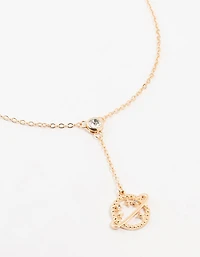 Collier en Y de la planète en diamants dorés