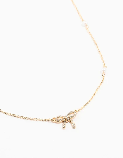 Gold Plated Station Pearl Diamante Bow Pendant Necklace