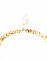 Collier en or superposé