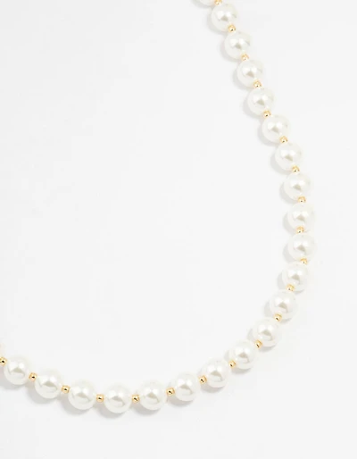 Collier plaqué or alternant perles moyennes et perles rondes
