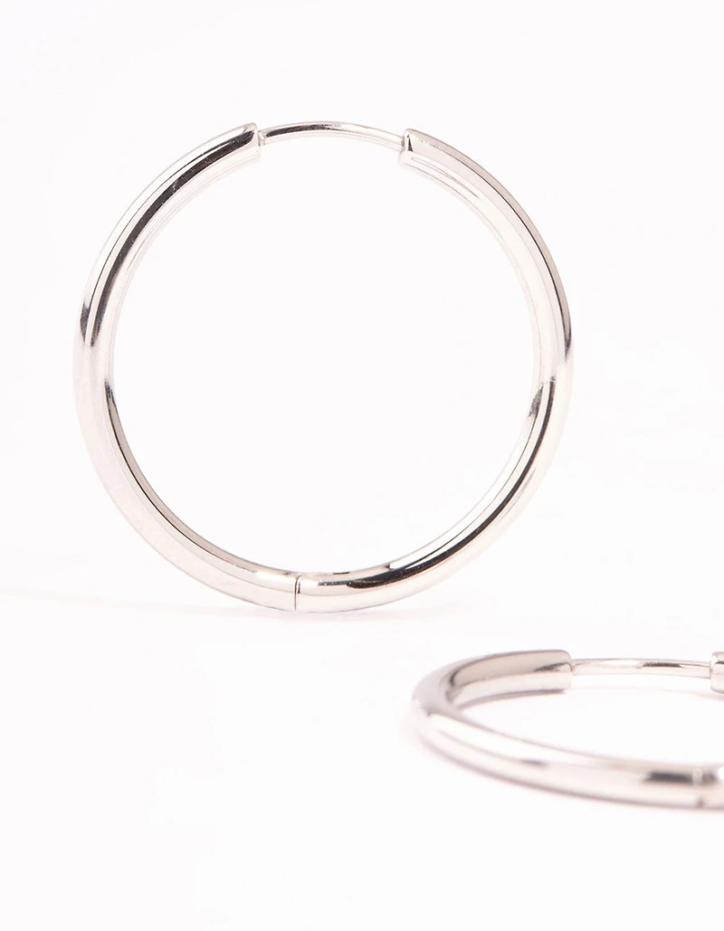 Boucles d’oreilles à cerceaux en acier cirurgique poli
