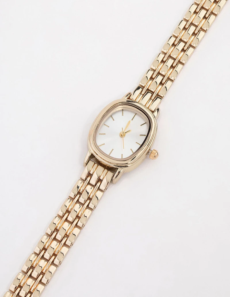 Petite montre ovale en or