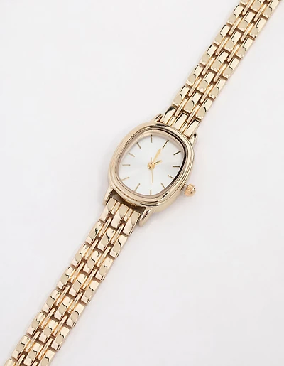 Petite montre ovale en or