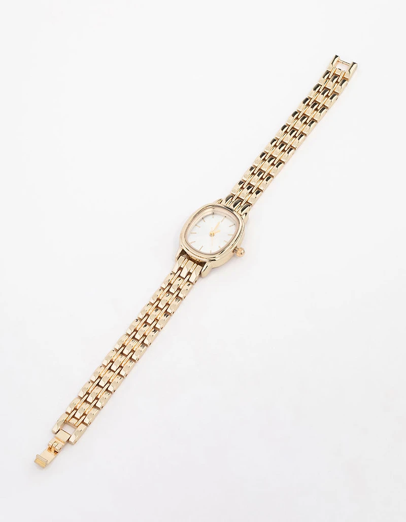 Petite montre ovale en or