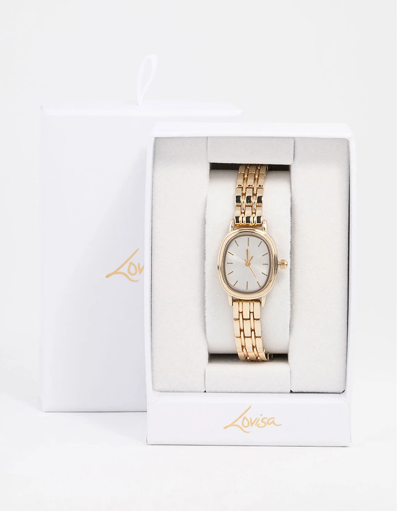 Petite montre ovale en or