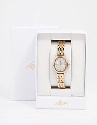 Petite montre ovale en or