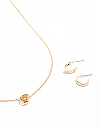 Collier pendentif mini sphère en or et ensemble de boucles d’oreilles en forme de cerceau élégantes