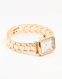 Montre rectangulaire aux chiffres romains dorés