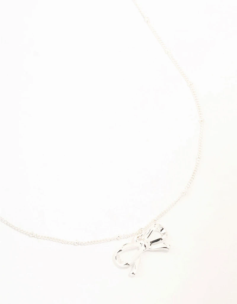 Collier nœud plaqué argent et chaîne à boule