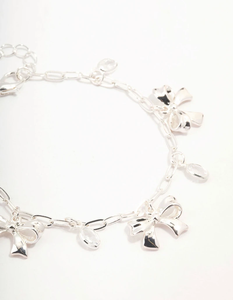 Silver Plated Alternating Cubic Zirconia & Bow Charm Bracelet