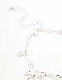 Silver Plated Alternating Cubic Zirconia & Bow Charm Bracelet