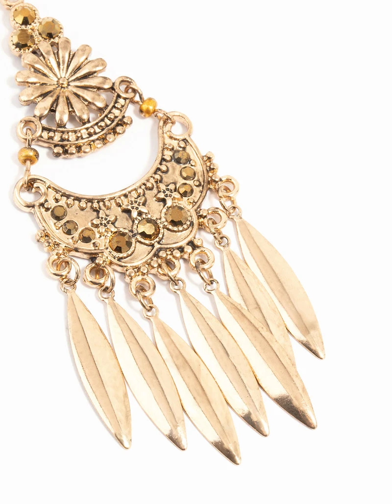 Grandes boucles d’oreilles longues à motif or ancien