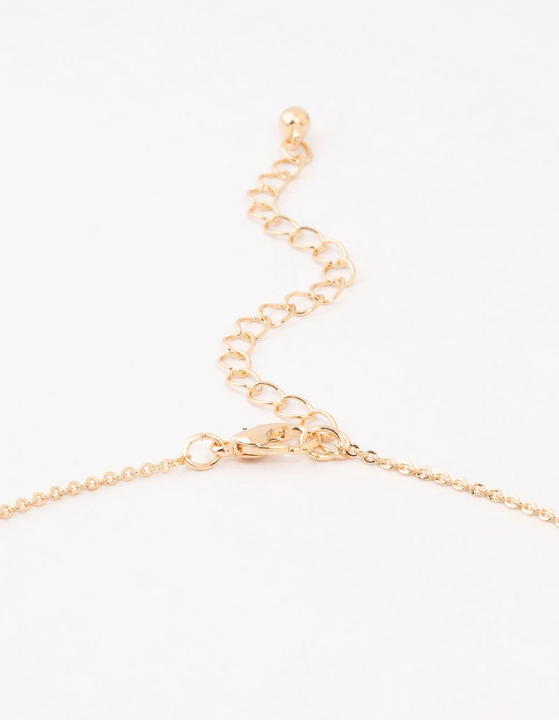 Gold Radiant Cubic Zirconia Cross Necklace