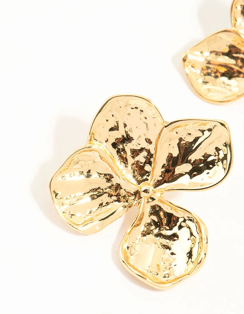 Boucles d’oreilles en forme de fleurs texturées dorées