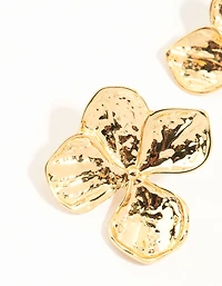 Boucles d’oreilles en forme de fleurs texturées dorées