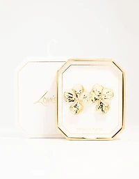 Boucles d’oreilles en forme de fleurs texturées dorées