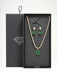 Coffret de colliers et boucles d’oreilles de tennis en diamants émeraude plaqués or