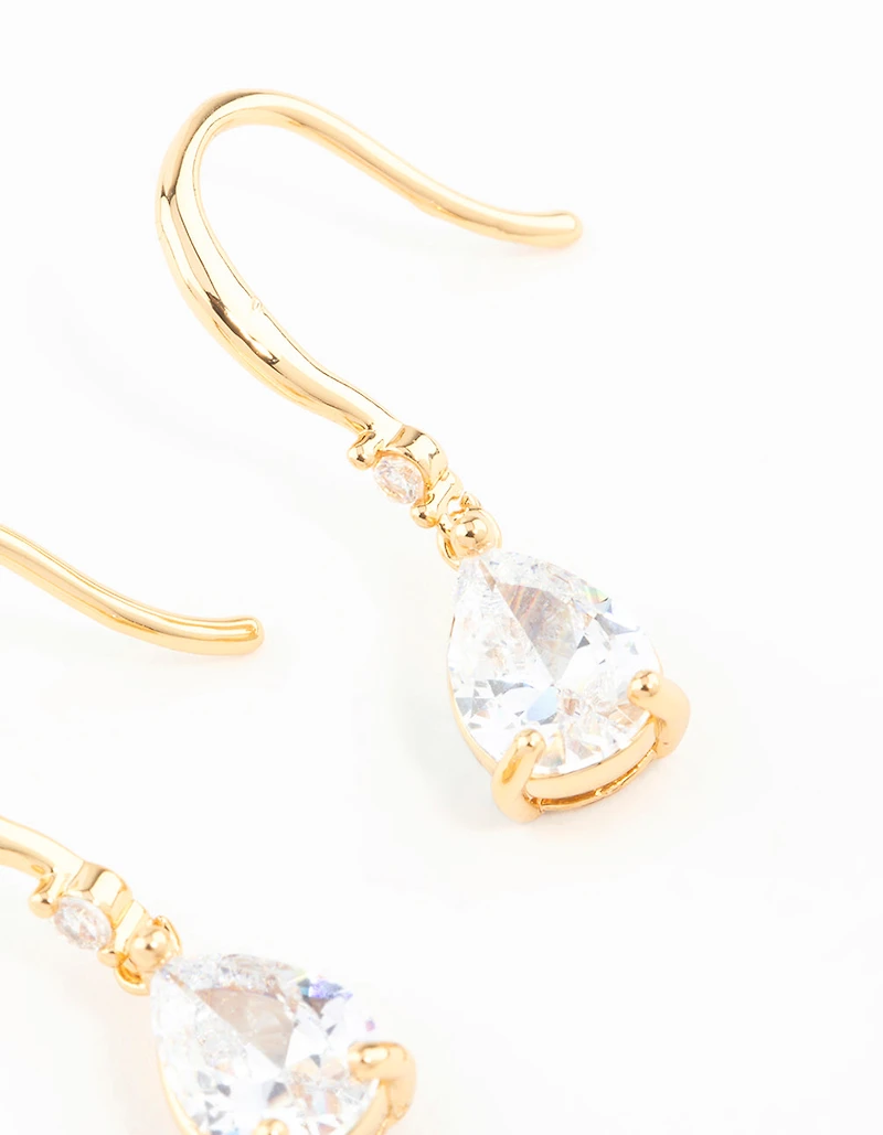 Boucles d'oreilles pendantes en zircon cubique taille poire plaqué or