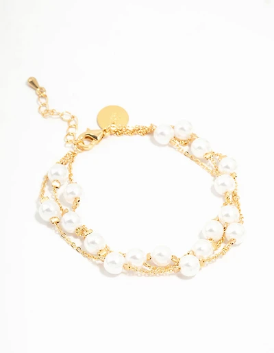 Bracelet à plusieurs rangs de perles plaqué or