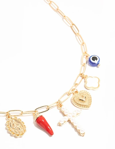 Croix en or et collier à charmes chili